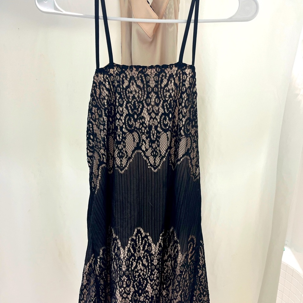 Lace, black and tan dress. Parisian brand size 8. fits more like a size 4-6.